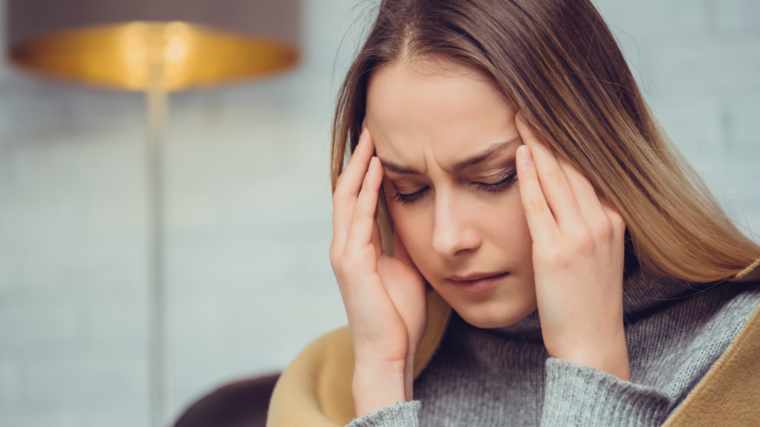 Lady with serious headache