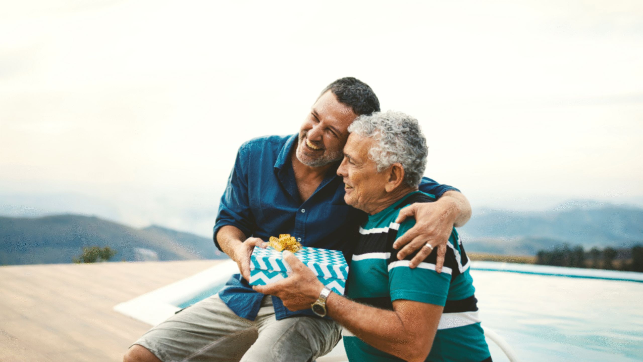 Man on the beach with his father