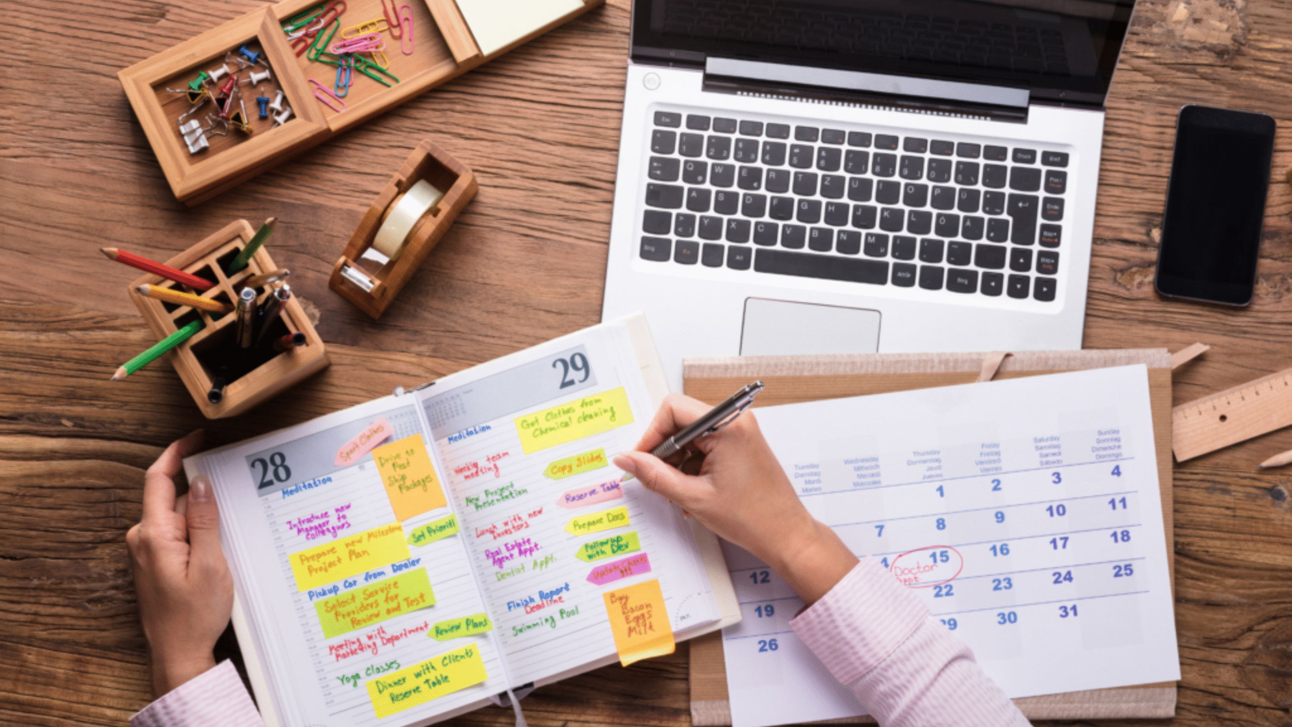 woman writing in symptom diary