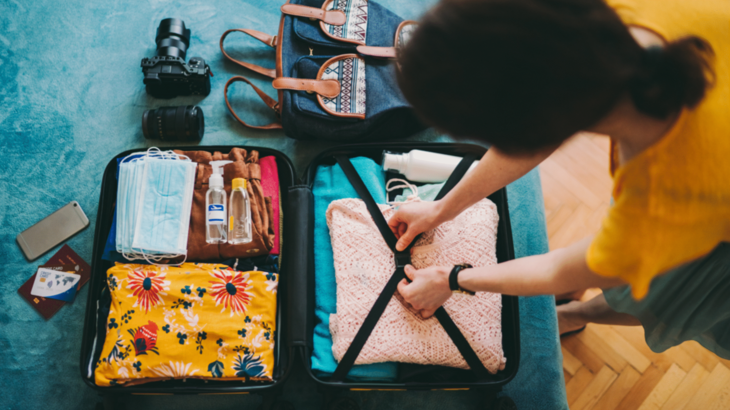 woman packing her suitcase for travel